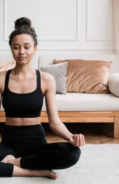 woman meditating meditation vs breathwork